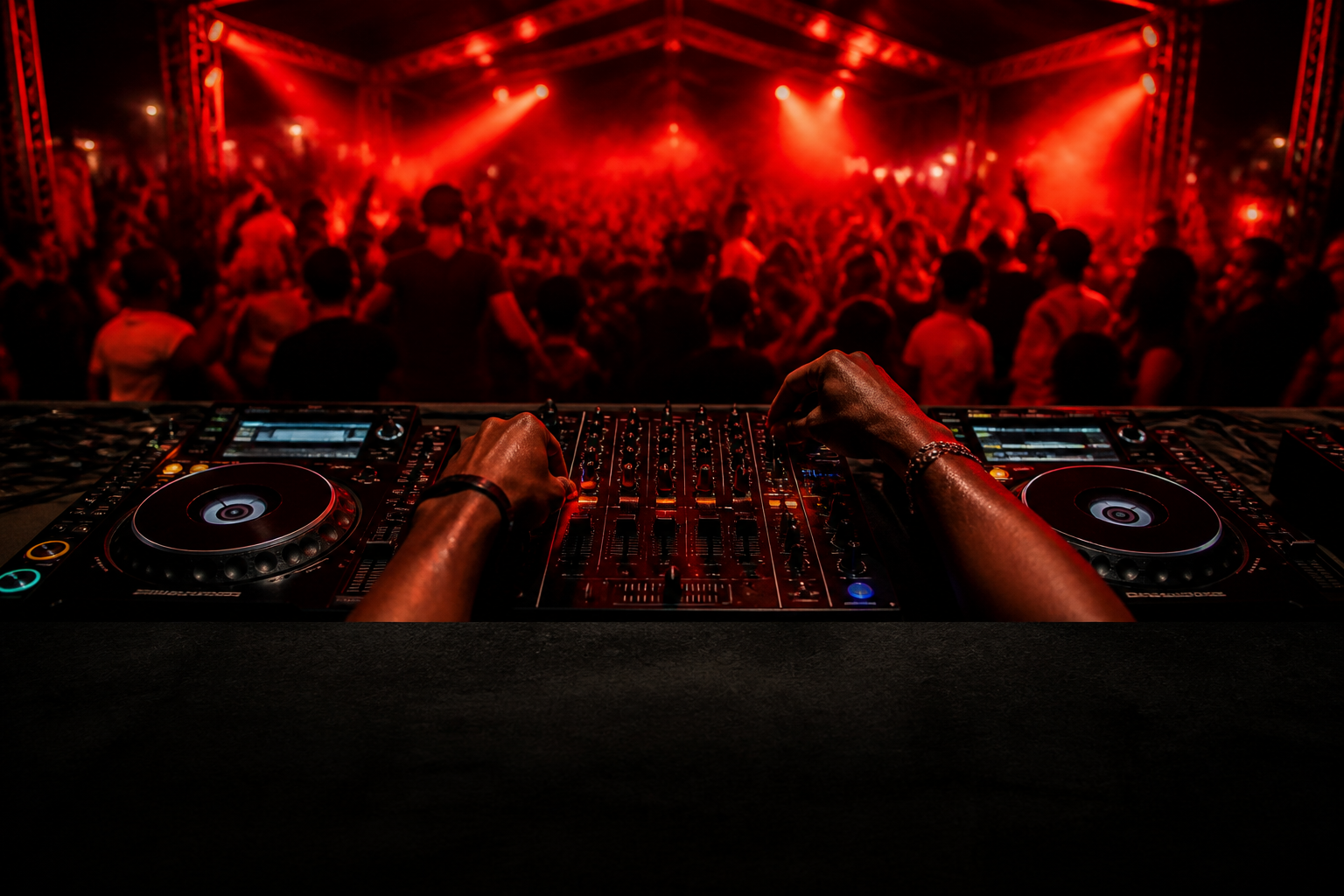 DJ Supreme in a live DJ moment, hands on the decks